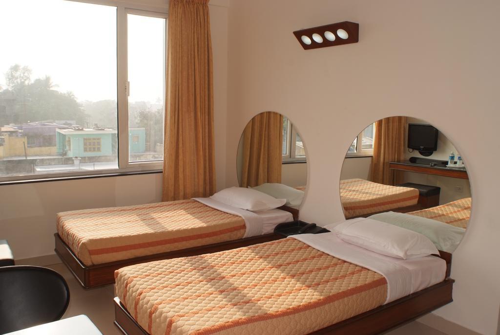 Lotus Comfort - A Pondy Hotel Puduččéri Pokoj fotografie